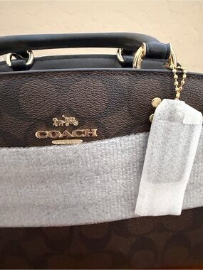 NWT Coach Brown Signature Canvas with Black Trim. Mini Lillie